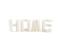 The Home Sculpture displays the word HOME in large, blocky white letters, each standing upright against a plain white background. With its contemporary shape and bright white color, this Home Sculpture is the perfect accent for modern decor.