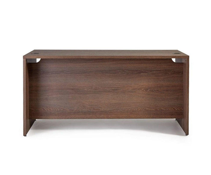 A rectangular wooden office desk with a dark brown finish, viewed from the front, featuring a solid panel and two cable holes at the back corners—perfectly blending modern desk functionality with classic style, as showcased in the sleek Inari 63″ Desk design.