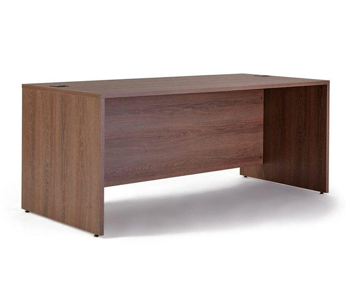The Inari 71″ Desk boasts a spacious, rectangular design with a rich brown finish. Featuring solid side panels and a front modesty panel, this office desk perfectly combines modern style and practical functionality for today’s workspaces.