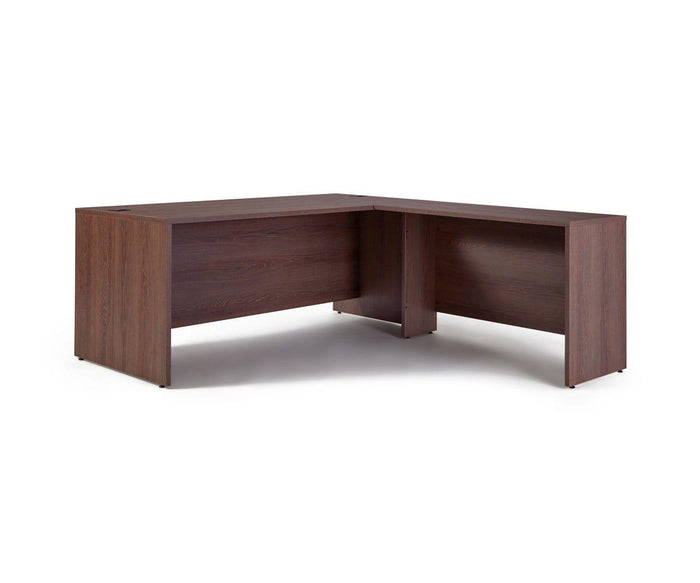 The Inari 71″ Desk is a brown wooden L-shaped office desk with a simple modern design, featuring two rectangular surfaces joined at a right angle and solid side panels for support.