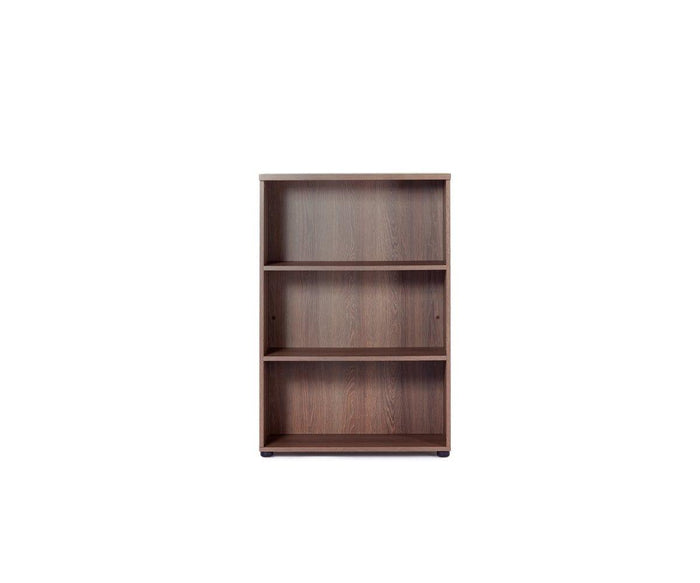 The Inari Low Bookcase is a three-shelf wooden unit with a simple design in a cool brown finish. Shown against a plain white background, it features empty, adjustable shelves—perfect for office storage.