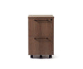 The Inari Mobile File Pedestal, in a cool brown finish, features two drawers with black handles, a lock on the top drawer, and black wheels for practical office organization, displayed against a white background.