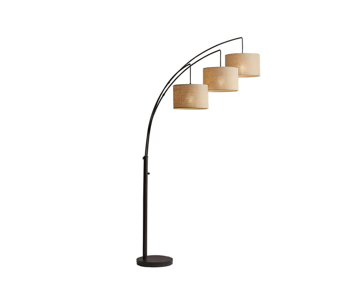 The Jan 3-Light Arch Floor Lamp features a sleek black arched stand and three beige textured fabric shades suspended at varying heights, providing soft illumination. It is supported by a round base for stability.