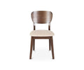 The Juneau Dining Chair, shown from the front against a white background, features a wooden frame with a walnut finish, a curved backrest, and a light beige, cream fabric seat.