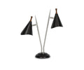 Introducing the Kabrino Table Lamp, a modern home office lamp featuring two black metal cone-shaped shades with wooden accents on top for a stylish touch. Its adjustable chrome arms and round black base complete the contemporary design.