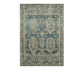 Karastan Marash Karamar Rug in Karamar Blue features a rectangular shape and showcases a detailed, vintage-inspired pattern in shades of blue, beige, and cream. This durable rug highlights geometric and floral motifs with a decorative border along all sides.