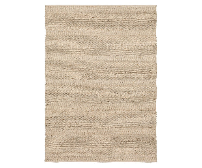 The Karastan Tableau Roma Rug in Roma Oyster features a rectangular, woven design with a simple, textured pattern and natural fiber appearance, reminiscent of a modern rug, shown against a white background.