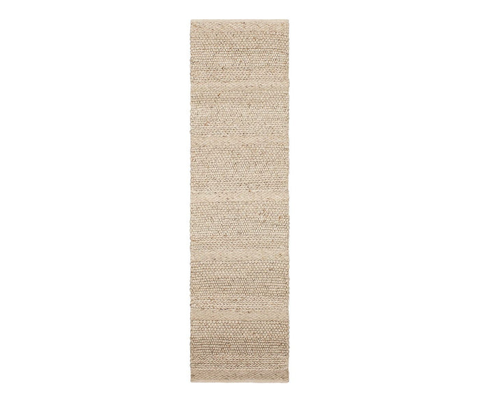 Karastan Tableau Roma Rug in Roma Oyster, shown from above against a white background. The rug features a textured, natural fiber appearance with horizontal weave patterns, blending classic style with the clean lines of modern design.