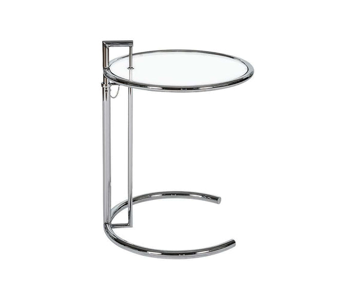 The Krom C-Table, featuring a clear glass top and chrome metal frame with a distinctive open circular base, provides adjustable height for versatile use in modern spaces.