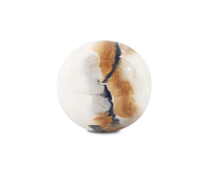 Showcasing a creamy white base adorned with brown and black marbled streaks that flow vertically across its polished, smooth form, the Lahar Iron Sphere adds volcanic-inspired elegance to any space.