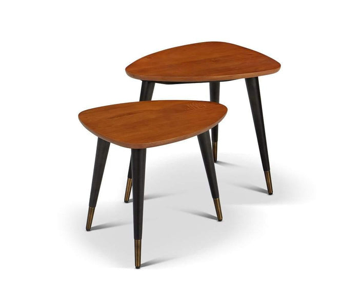 The Lanson Nest Of Tables includes two mid-century modern nesting tables, each crafted from American poplar wood with triangular tops, black tapered legs, and brass-colored tips, set against a white background.