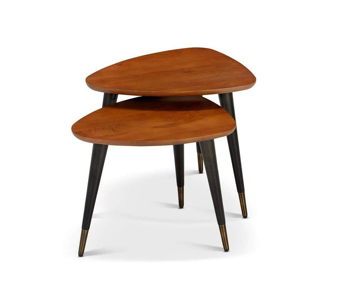 The Lanson Nest Of Tables features two stacked, triangular nesting tables skillfully crafted from American poplar wood, each supported by three black tapered legs accented with brass tips and showcasing a timeless mid-century modern design.