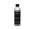 A silver bottle with a black label reads “Leather Cleaner” and “Scandinavian Designs Furniture.” Specially formulated for smooth leather, this bottle has a black cap and contains 16 oz (473 ml) of cleaner designed to care for your leather furniture.