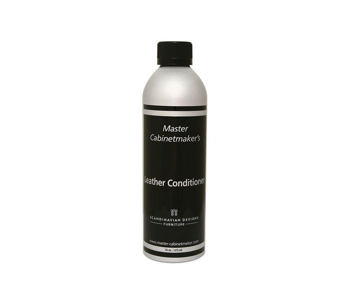 A silver and black bottle labeled Leather Conditioner with a black cap, standing upright on a white background—ideal for smooth leather and essential for complete leather furniture maintenance.