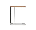 The Leende C-Table features a minimalist C-shaped design with a European oak wooden top in an oiled honey finish and a slender black metal frame, crafted to slide under sofas or chairs for space-saving convenience and a rustic-industrial aesthetic.