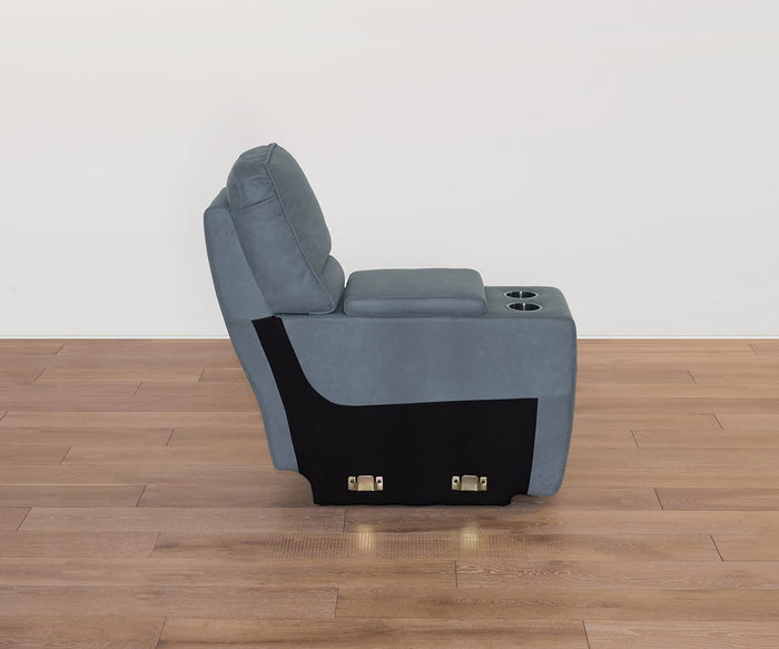 A gray Lunna Console reclining chair with cup holders, featuring leather-look fabric, is positioned on a wooden floor against a plain white wall and displayed from the side. Drawing inspiration from modular design principles, this chair blends comfort with contemporary style.