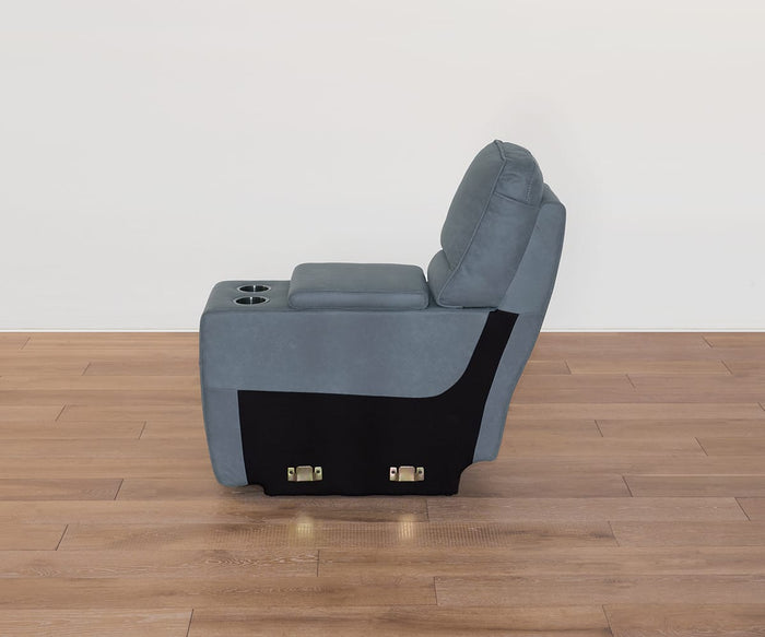 A Lunna Console recliner chair in gray, upholstered in leather-look fabric and featuring cup holders integrated into the armrest, is placed on a wooden floor against a plain white wall. The chair is shown in profile, facing right.