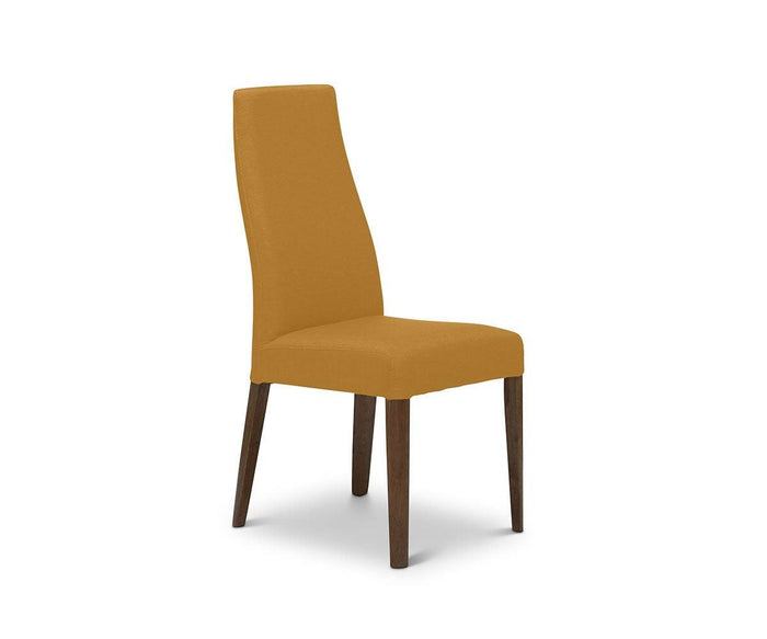 A contemporary Lussa Fabric Dining Chair with a tall backrest and seat upholstered in mustard-yellow fabric, supported by four sturdy solid wood legs, displayed against a plain white background.