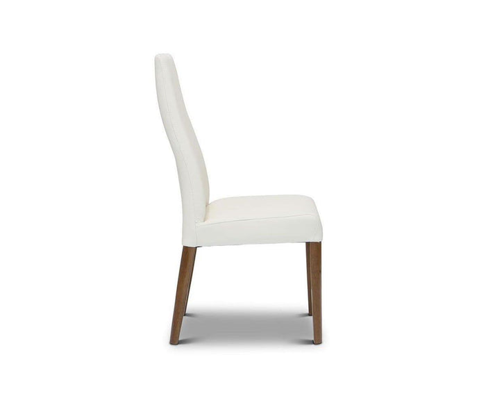 Side view of the Lussa Leather Dining Chair, showcasing its tall backrest and seat upholstered in white leather. The chair is supported by straight, solid wood legs and is positioned against a simple white background.