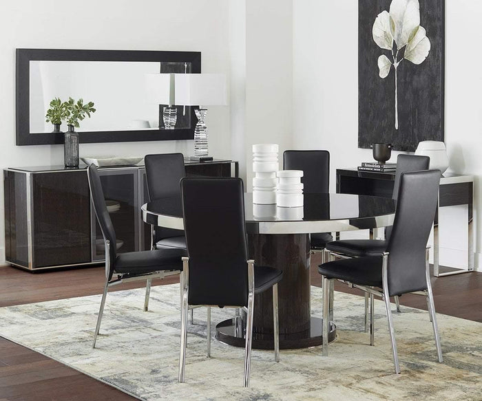 Modern dining room with a round black table and six Lykke High Back Dining Chairs offering padded comfort, a large framed mirror, sideboard with decor, white lamp, and abstract floral artwork on the wall. The space features a light rug and hardwood floors.