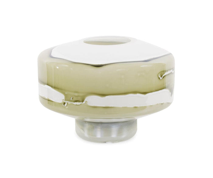 The Malin Vase is a modern, round glass vase with a wide body, narrow base, and small circular opening. It features a layered, abstract design with neutral shades of light green and white horizontal bands in a Green/Multi color palette.