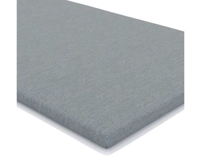 A close-up view of the Mattress Topper, featuring a rectangular shape and light gray smooth fabric cover, displayed on a white background.