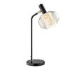 The Naeva Table Lamp in black features a contemporary design with a sleek base and stand, complemented by an angled double-glass shade with a marbled white interior that provides soft illumination, showcased against a white backdrop.
