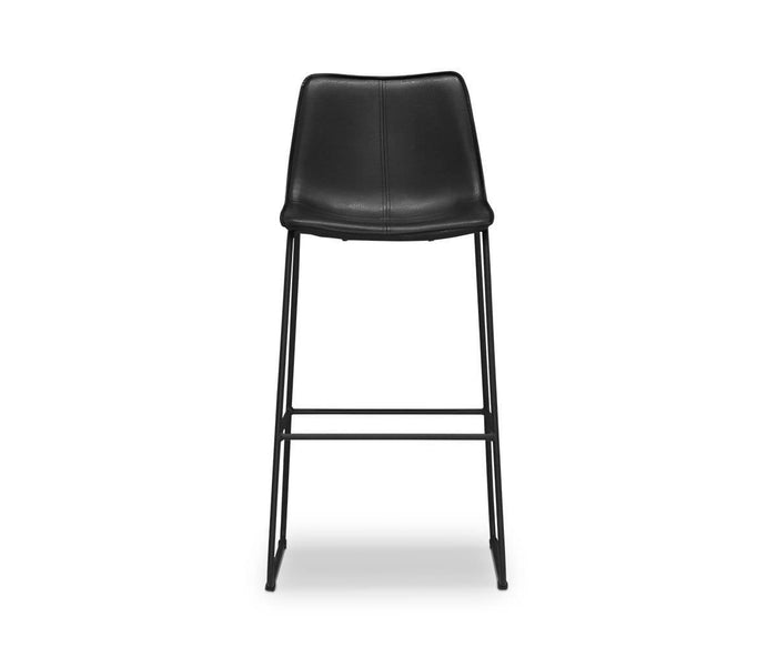 The Oken Bar Stool, shown in black, features a modern design with a padded seat and backrest, slim metal legs, and a footrest, displayed against a white background.