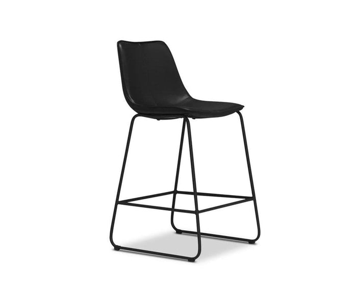 Introducing the Oken Counter Stool, a modern black bar stool featuring a molded seat, slender black metal legs, a low backrest, and a convenient footrest bar connecting the legs for enhanced support.
