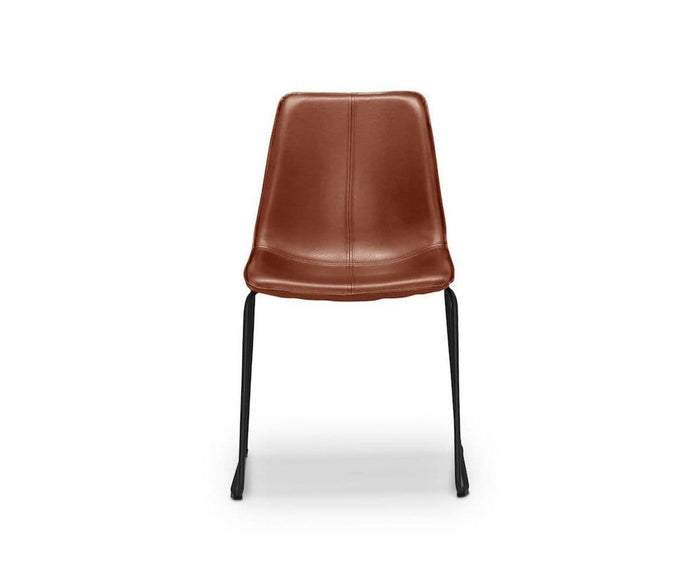 The Oken Dining Chair in saddle leather, featuring black metal legs, is shown from the front against a white background.