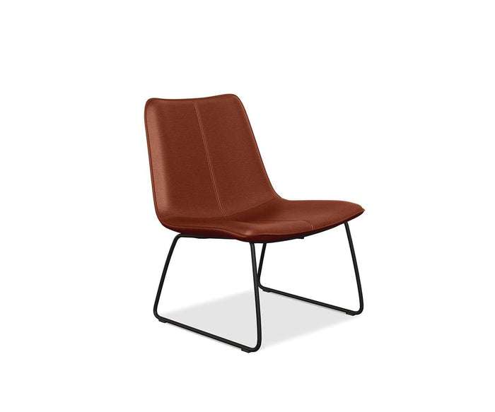 The Oken Lounge Chair is a modern brown minimalist piece with a slim, cushioned seat and backrest, complemented by slender black metal legs. Designed for comfortable seating, it is showcased against a plain white background.