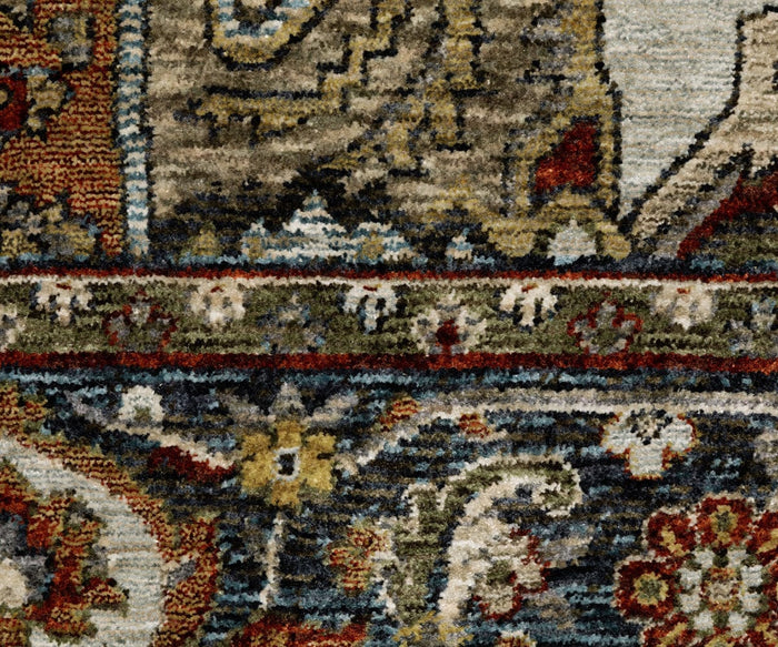 Close-up of the Oriental Weavers Aberdeen / 1144W Rug, showcasing intricate floral and geometric motifs in rich shades of red, blue, green, cream, and gold. Inspired by classic Persian patterns, the design highlights the textured woven fibers, adding vibrant detail and timeless boho charm to any space.