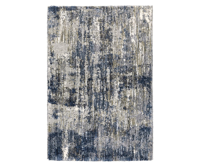The Oriental Weavers Aspen / 2061L Rug showcases an abstract, textured design in blue and multi-toned shades, featuring a blend of vertical and scattered patterns crafted from space-dyed microfiber polyester for a modern, distressed appearance.