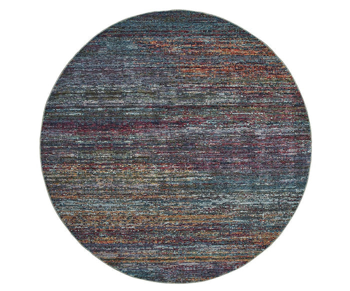 The Oriental Weavers Atlas / 8037B Rug is a round area rug in a multi-color palette, featuring textured patterns with shades of blue, purple, red, and brown for a woven, slightly distressed appearance. Machine-woven for durability and lasting vibrancy, this rug brings style from the Atlas Collection to your space.
