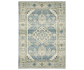 The Oriental Weavers Branson / BR03A Rug is a rectangular area rug in Blue/Multi, featuring a central diamond medallion and intricate borders in a vintage, distressed style. Power-loomed for durability, this rug effortlessly combines classic charm with modern motifs for timeless appeal.