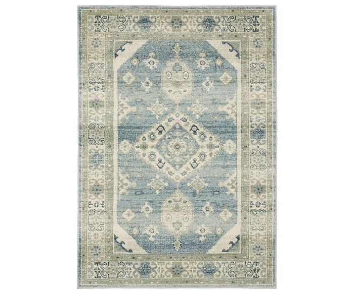 The Oriental Weavers Branson / BR03A Rug is a rectangular area rug in Blue/Multi, featuring a central diamond medallion and intricate borders in a vintage, distressed style. Power-loomed for durability, this rug effortlessly combines classic charm with modern motifs for timeless appeal.