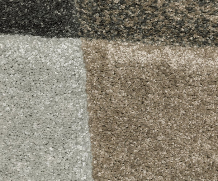 Four textured carpet squares from the Oriental Weavers Cambria / 84J Rug are arranged in a grid, showcasing shades of gray, beige, brown, and dark brown. Each square displays subtle geometric motifs and varied fibers, adding visual interest reminiscent of a high-pile rug.