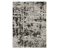 The Oriental Weavers Caravan 4153Q Rug in Grey/Multi features a rectangular design with an abstract, nature-inspired pattern in versatile shades. Crafted from space-dyed polyester, this rug delivers a modern, textured look with scattered and uneven patterns for a contemporary appeal.