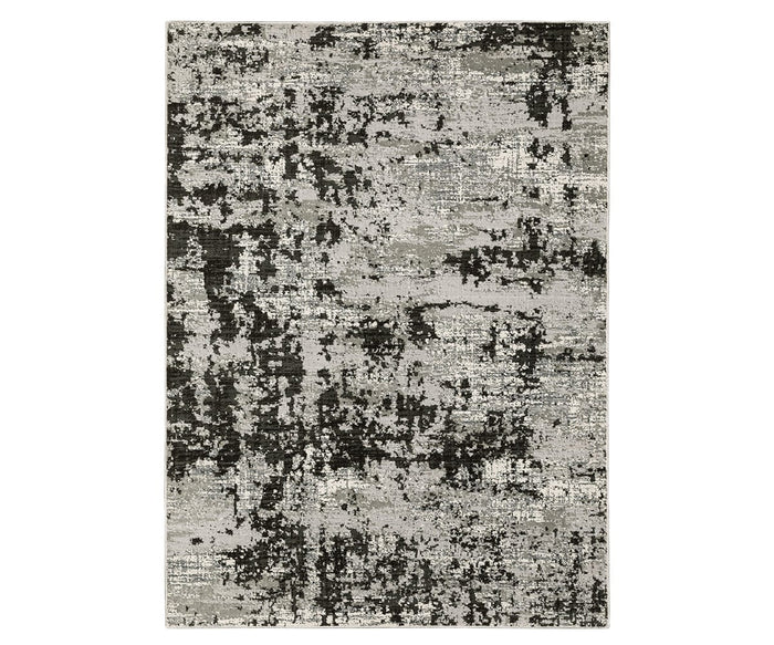 The Oriental Weavers Caravan 4153Q Rug in Grey/Multi features a rectangular design with an abstract, nature-inspired pattern in versatile shades. Crafted from space-dyed polyester, this rug delivers a modern, textured look with scattered and uneven patterns for a contemporary appeal.