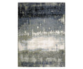 The Oriental Weavers Caravan 5571H Rug features a space-dyed polyester construction and a textured pattern in Grey/Multi tones, blending blue, gray, white, and beige for a nature-inspired abstract gradient design.