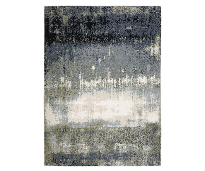 The Oriental Weavers Caravan 5571H Rug features a space-dyed polyester construction and a textured pattern in Grey/Multi tones, blending blue, gray, white, and beige for a nature-inspired abstract gradient design.