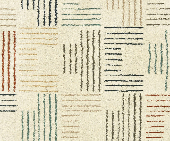 Featuring a cream background adorned with vertical and horizontal rows of short, wavy lines in red, blue, brown, tan, and gray—arranged in rectangular clusters—the Oriental Weavers Carson / 9663A Rug brings a modern touch to any space. Inspired by the Carson Collection, this rug mimics contemporary artistic patterns while providing plush comfort underfoot.