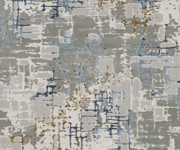 The Oriental Weavers Easton 8111X Rug features an abstract pattern with overlapping blocks in shades of gray, blue, white, and touches of brown for a textured, modern geometric look. Power-loomed from polypropylene as part of the Easton Collection, this rug blends striking contemporary style with long-lasting durability.