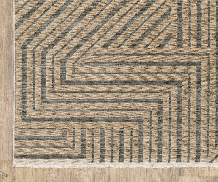 A close-up of the Oriental Weavers Echo ECH01 Rug, power-loomed with a taupe and gray striped pattern forming sharp angles, placed on a light wood floor. Made in Egypt.