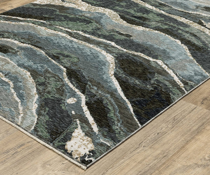 The Oriental Weavers Echo ECH12 Rug, a rectangular piece that is power-loomed in Egypt, showcases an abstract wavy pattern in green, blue, white, and beige hues as it lies on a light wood floor.