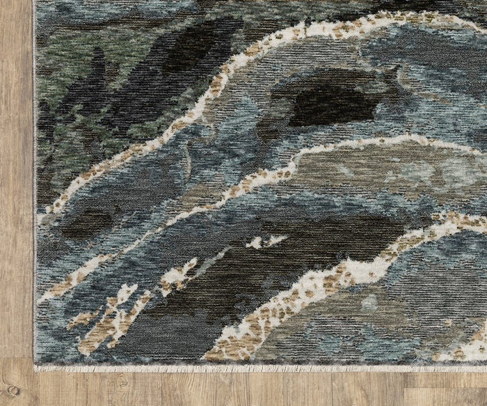 Here’s the sentence rewritten using the given product data: A close-up of the Oriental Weavers Echo ECH12 Rug, rectangular in shape with an abstract pattern in shades of blue, gray, and green, displayed on a light wood floor. Power-loomed for durability and style, this expertly crafted rug from Egypt features a fringe on one edge.