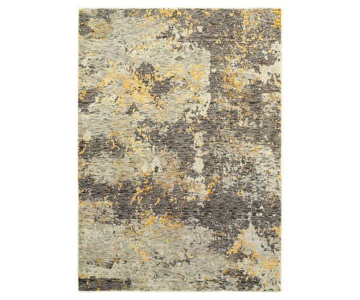 The Oriental Weavers Evolution / 8025B Rug is a rectangular area rug from the Evolution Collection, featuring an abstract multi-color pattern that resembles a textured or weathered surface. Crafted from durable nylon and machine-woven for long-lasting style and resilience.