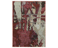 The Oriental Weavers Evolution / 8028B Rug is an abstract rectangular area rug from the Evolution Collection, woven in the USA with a durable nylon polypropylene blend. It features a multi-colored design in shades of red, beige, gray, and burgundy forming an irregular, painterly pattern.