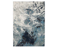 The Oriental Weavers Evolution / 962A Rug is a rectangular area rug from the Evolution Collection, showcasing an abstract design in blue and multi-colored tones reminiscent of ocean waves or swirling water. Made from durable nylon, this stylish rug is easy to maintain and offers both practicality and visual appeal for any space.