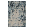The Oriental Weavers Hayden HAY04 Rug showcases a rectangular design with an abstract, distressed pattern in blue and multi-toned shades, crafted from space-dyed polyester for a contemporary, textured look.
